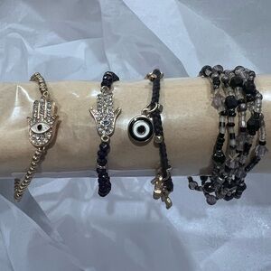 Gold and Black Evil Eye / Hamsa Bracelets and Black and Clear Bracelets